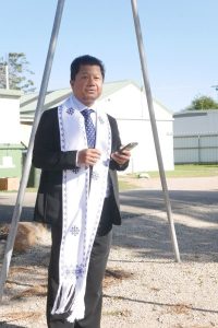 Rev Ram Thanga Blessing the Community Garden beds at Paynesville