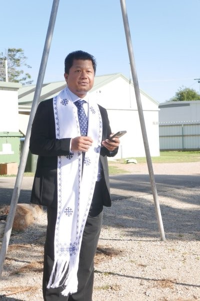 Rev Ram Thanga Blessing the Community Garden beds at Paynesville